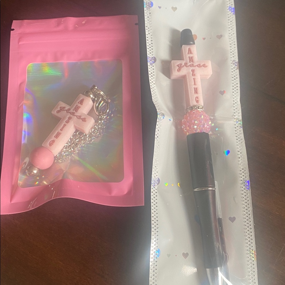 Pink Cross Keychain with Silver Chain and Pen.